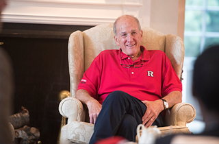 Rutgers president Robert Barchi at a meeting in his home